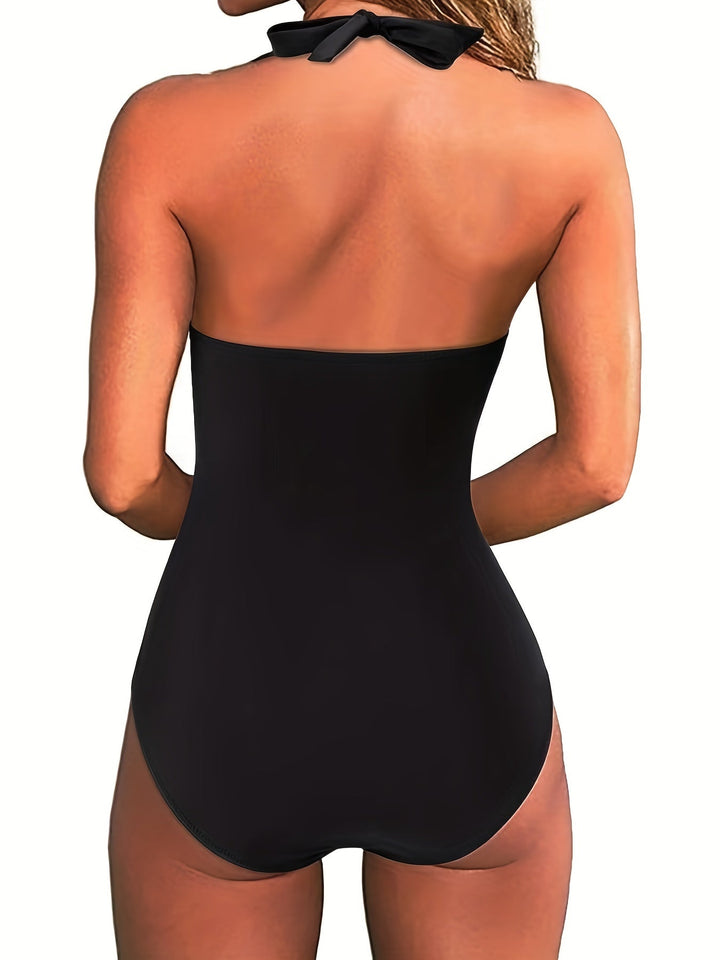 Chic und Stil | Halter-neck swimsuit with V-neckline and print