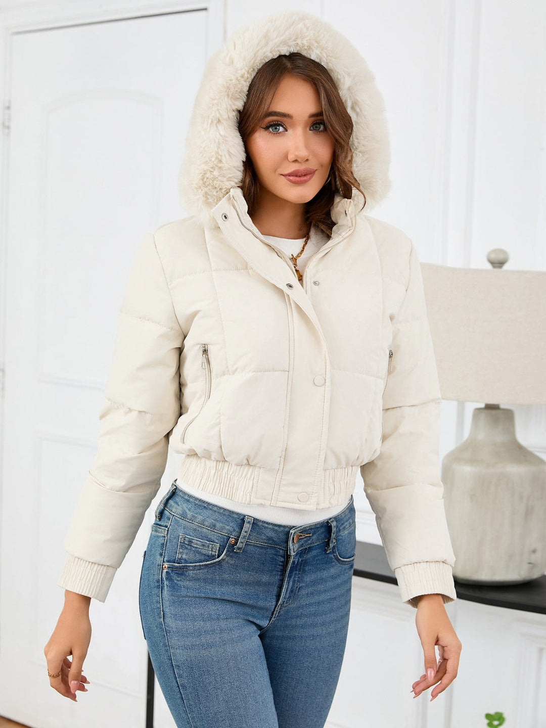 Chic und Stil | Cozy padded winter jacket with fur hood and pockets