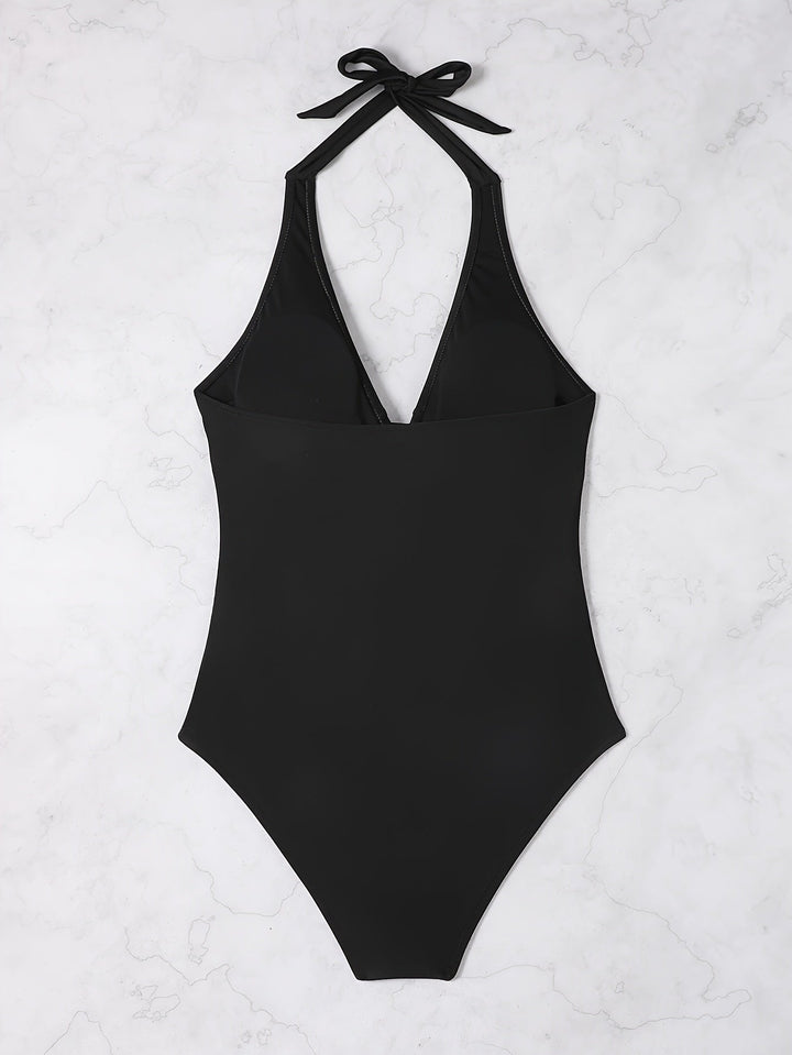 Chic und Stil | Halter-neck swimsuit with V-neckline and print