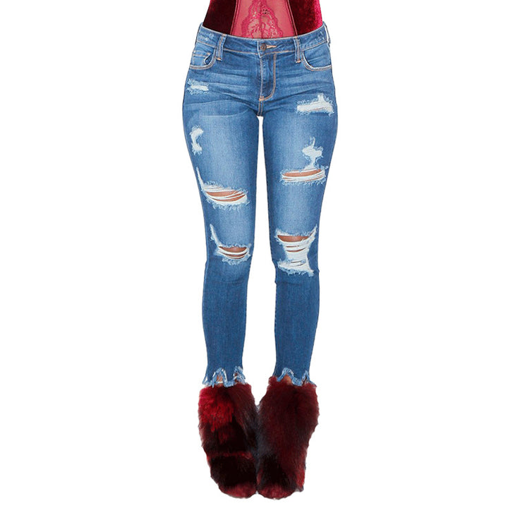 Jeans skinny pour femmes dans un style détruit à la mode avec des ourlets effilochés Lune London