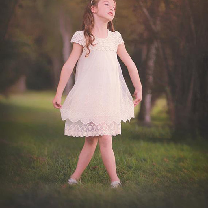Ladies lace dress with floral design and flared hem Lune London