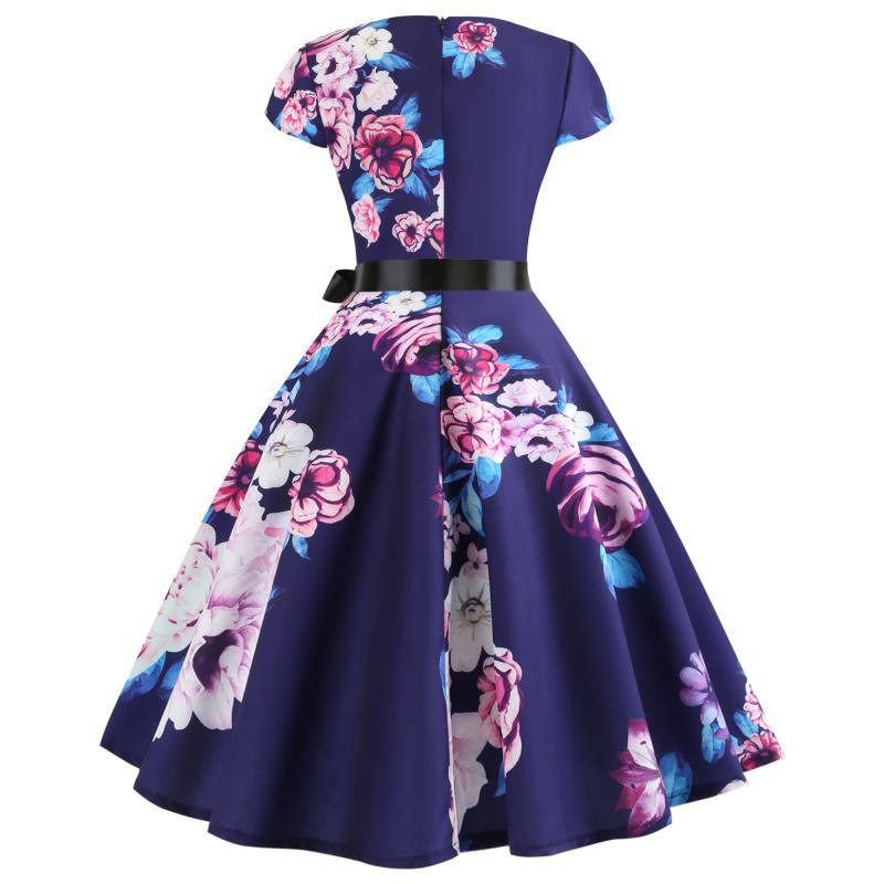 Robe midi à col rond pour femmes avec design floral et jupe évasée Chic & Stil