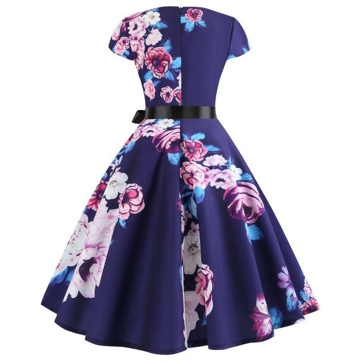Robe midi à col rond pour femmes avec design floral et jupe évasée Chic & Stil