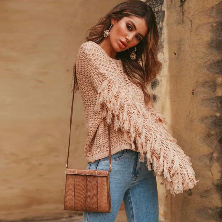 Ladies chunky knit sweater with fringed sleeves and a relaxed fit Lune London