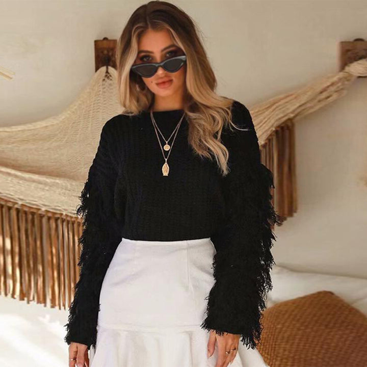 Ladies chunky knit sweater with fringed sleeves and a relaxed fit Lune London