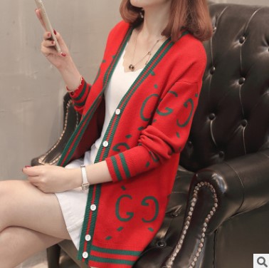 Women's knit jacket with deep V neckline and colorful graphic patterns Lune London