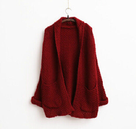 Women thick knit open sleeve cardigan with practical pockets Lune London