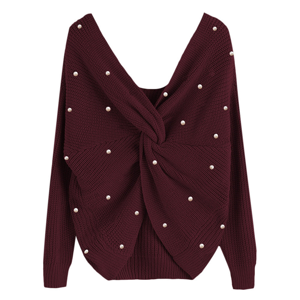 Knitted sweater for women with an asymmetrical design at the back and pearl embellished elements Lune London