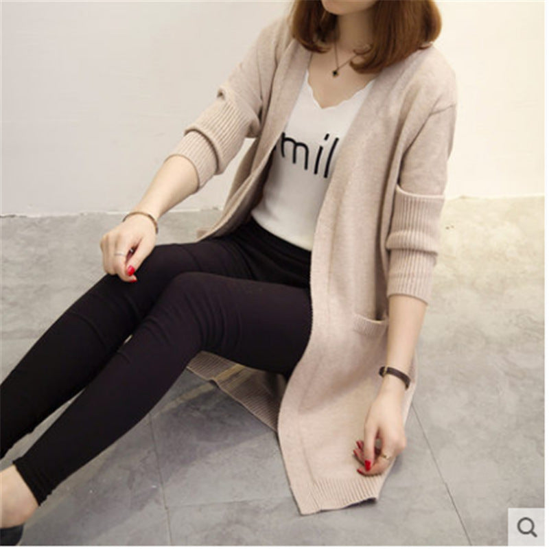 Women's knit jacket with open cut and practical pockets Lune London