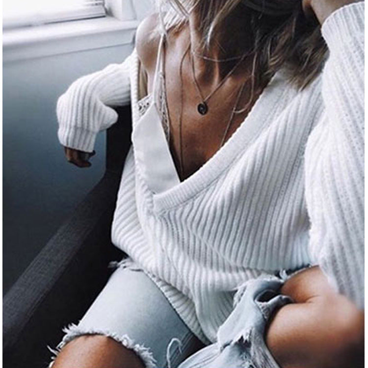 Casual knitted sweater for women with asymmetrical neckline and loose fit Lune London