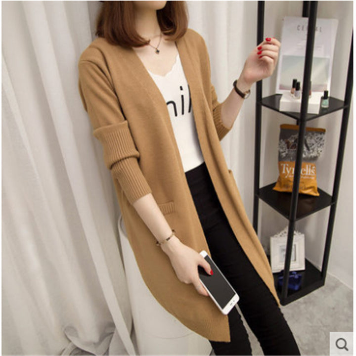 Women's knit jacket with open cut and practical pockets Lune London