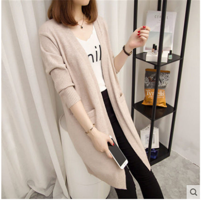 Women's knit jacket with open cut and practical pockets Lune London