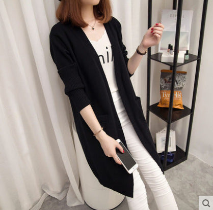 Women's knit jacket with open cut and practical pockets Lune London