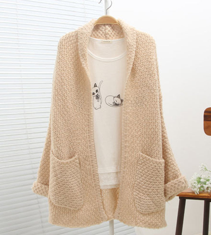 Gilet en tricot épais pour femmes avec bords bruts et poches pratiques Chic & Stil