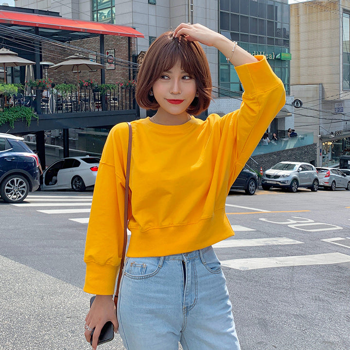 Pull court rayé pour femmes avec manches ballon Chic & Stil