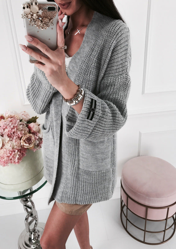 Ladies chunky knit cardigan with trendy details and pockets Lune London