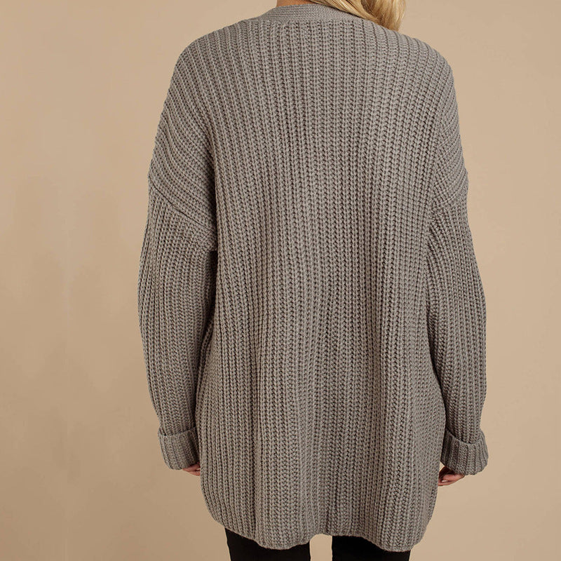 Womens chunky knit jacket with deep V-neck and relaxed fit Lune London