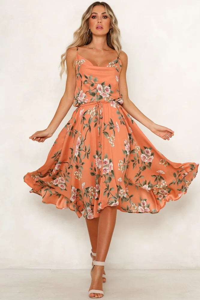 Robe midi femme avec motif floral et silhouette aérienne Chic & Stil