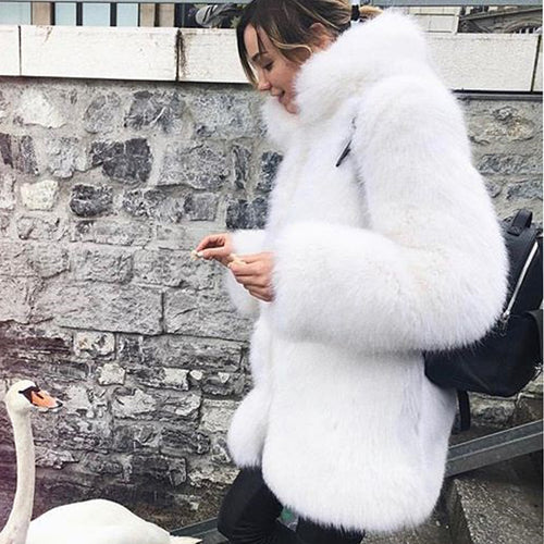 Luxurious faux fur coat for women with voluminous sleeves Lune London