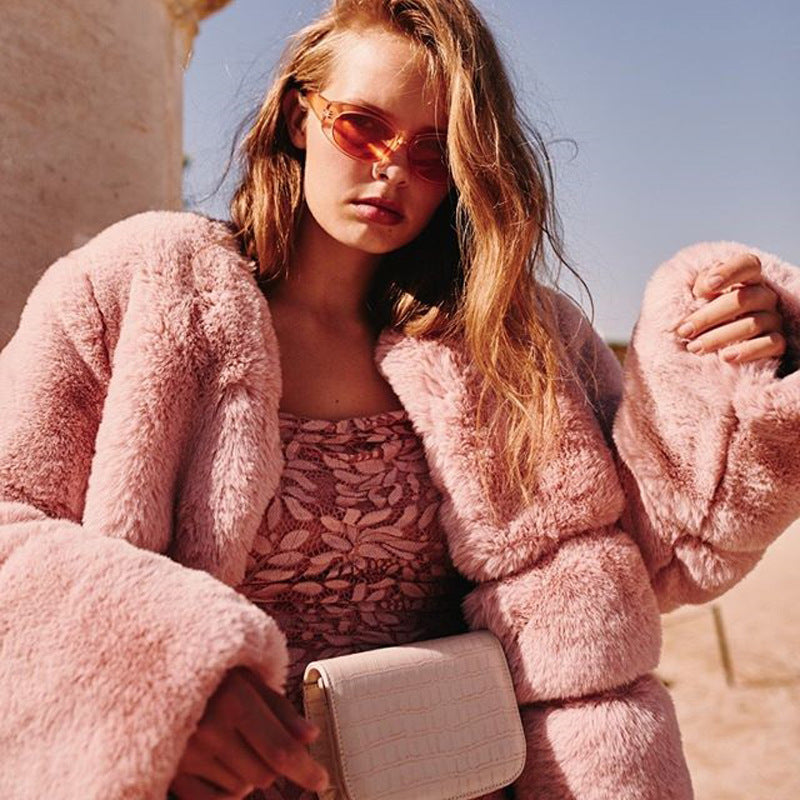 Ladies Fashion Faux Fur Jacket with Voluminous Puffed Sleeves and a Neck Closing Design Lune London