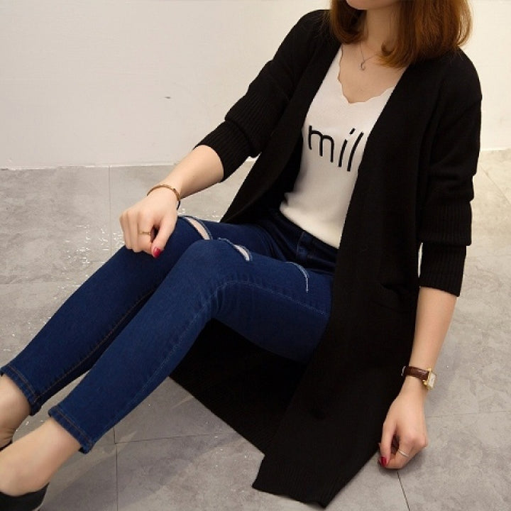 Ladies Long knitted cardigan with open front parts and deep pockets Lune London