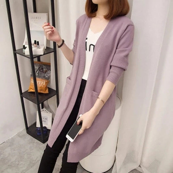 Ladies Long knitted cardigan with open front parts and deep pockets Lune London