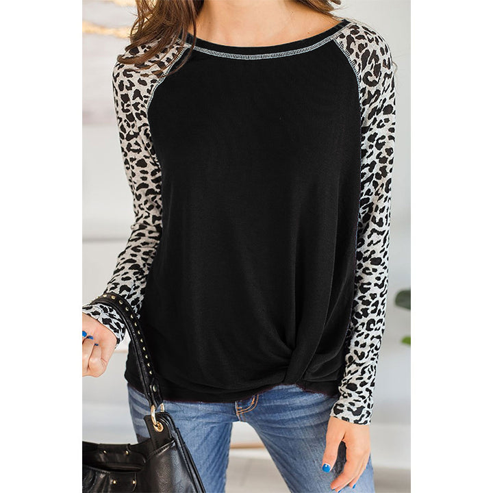 Top for women with an asymmetrical knot design and trendy animal print sleeves Lune London