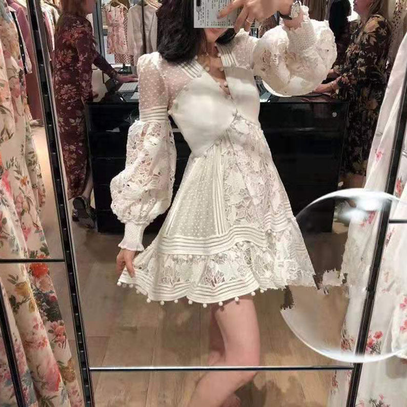 Women's playful floral dress with ruffle details and sheer puff sleeves Lune London
