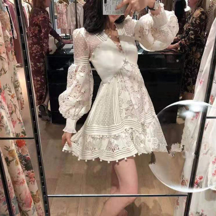 Women's playful floral dress with ruffle details and sheer puff sleeves Lune London