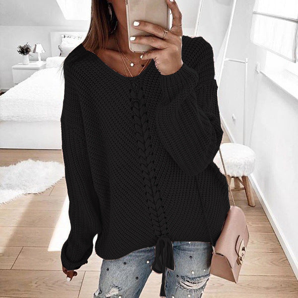 Chunky knit sweater for women with romantic lace-up details and a relaxed fit Lune London