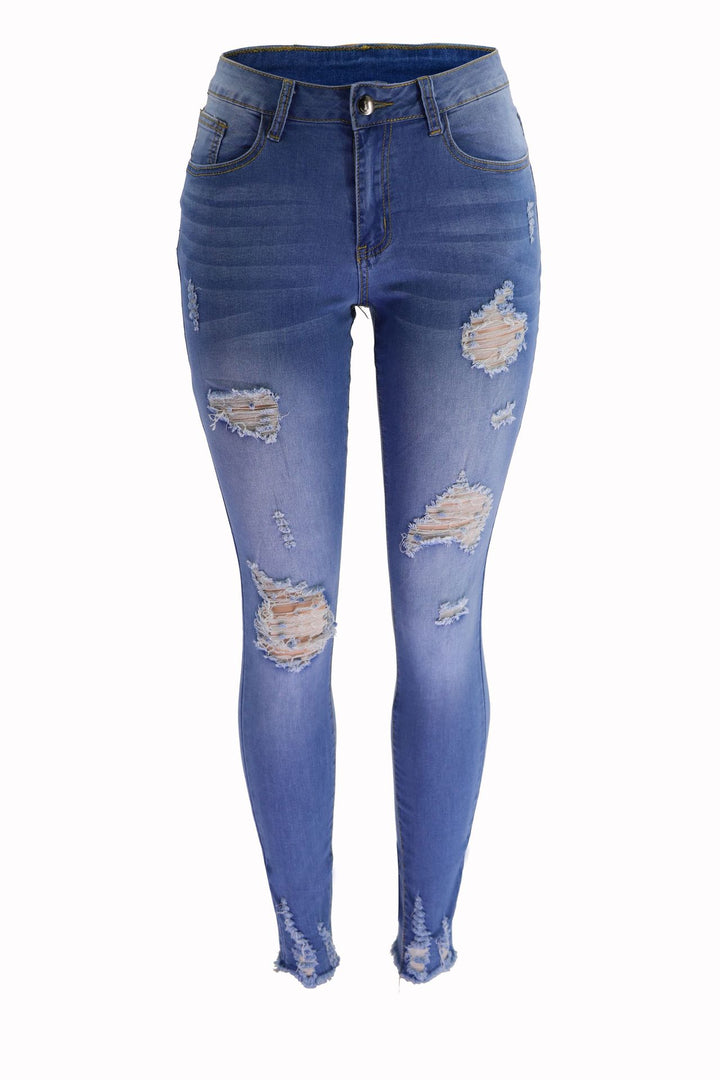 Skinny jeans for women with a modern destroyed look featuring trendy tear details Lune London