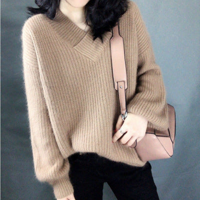 Women's knitted pullover with V-neck and voluminous sleeves Lune London