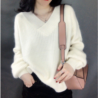 Women's knitted pullover with V-neck and voluminous sleeves Lune London