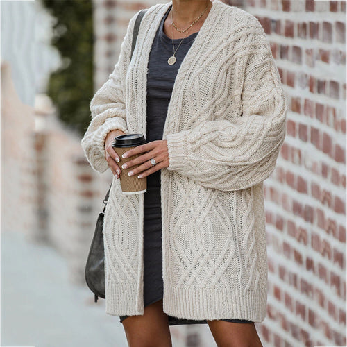Thick knitted cardigan for women with an elegant cable pattern and a relaxed fit Lune London
