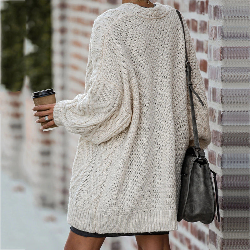 Thick knitted cardigan for women with an elegant cable pattern and a relaxed fit Lune London