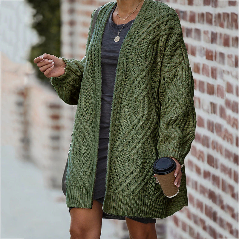 Thick knitted cardigan for women with an elegant cable pattern and a relaxed fit Lune London
