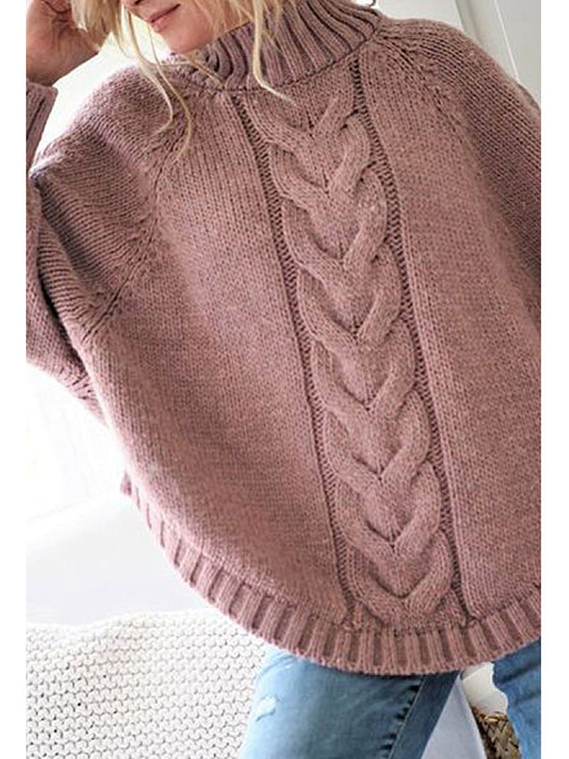 Oversized knitted sweater for women with a high neck and detailed cable design Lune London