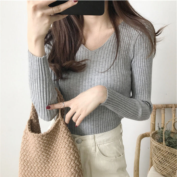 Long sleeve blouse for women with V-neck and textured ribbed design Lune London