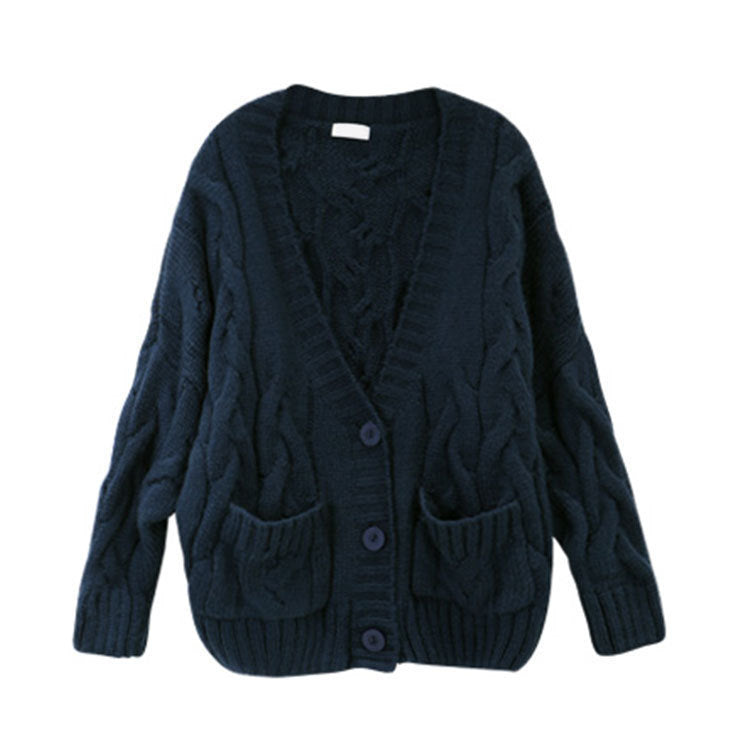 Thick knitted cardigan for women with classic braid pattern and practical pockets Lune London