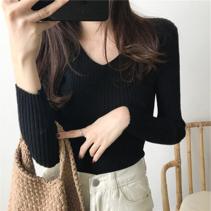 Long sleeve blouse for women with V-neck and textured ribbed design Lune London