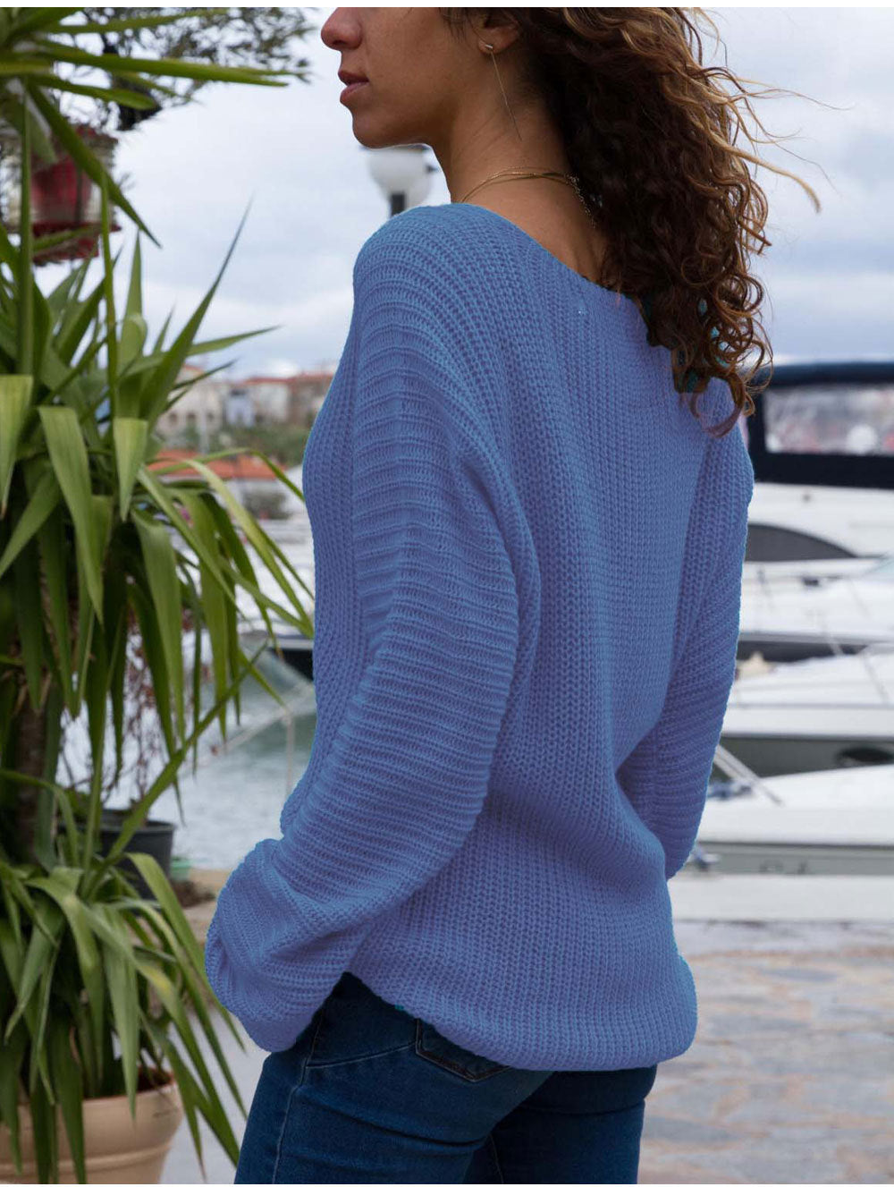 Oversized women's V-neck sweater with textured knit design Lune London