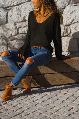 Oversized women's V-neck sweater with textured knit design Lune London