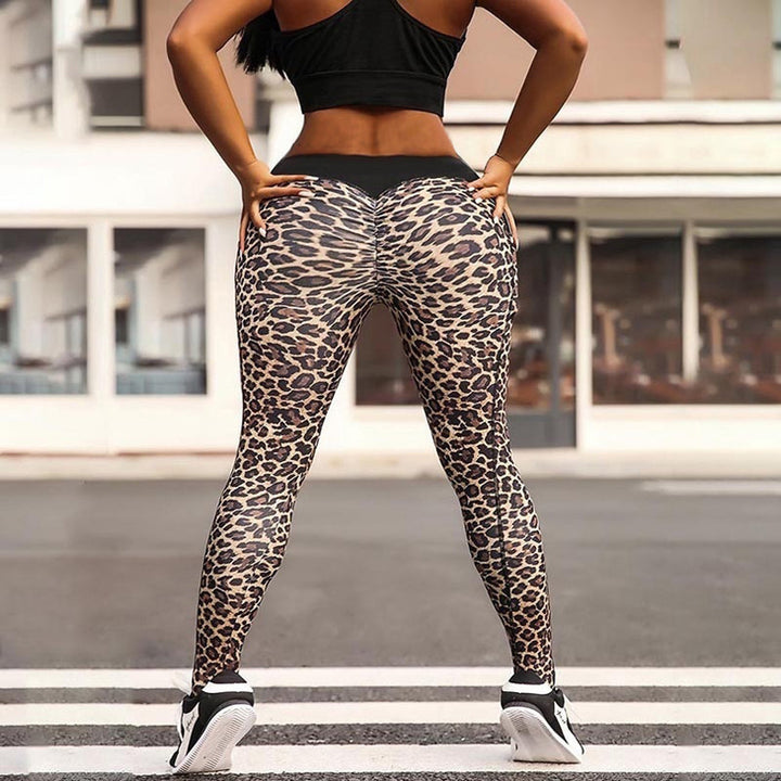 Women's sports leggings with a modern leopard print and practical pockets Lune London