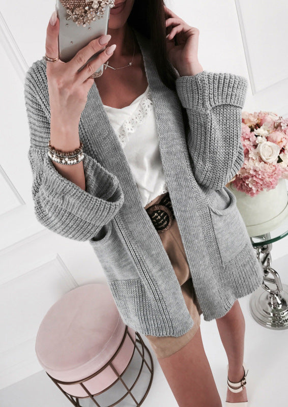 Ladies chunky knit cardigan with trendy details and pockets Lune London