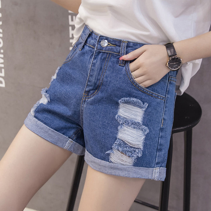 Women's denim shorts with trendy distressed design and casual cuff