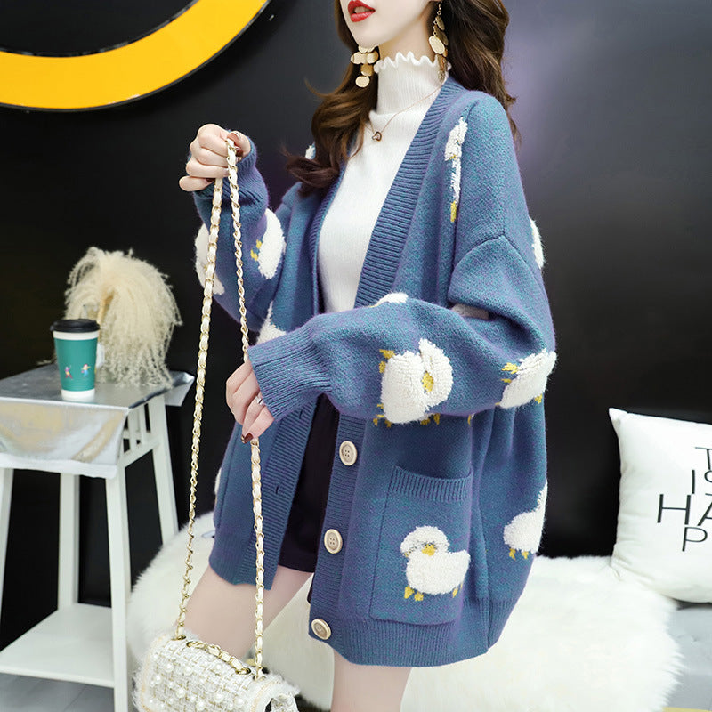 Women’s knit jacket with playful sheep pattern and pockets Lune London