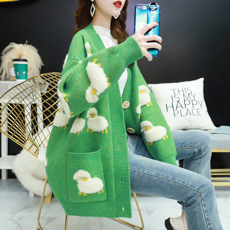 Women’s knit jacket with playful sheep pattern and pockets Lune London