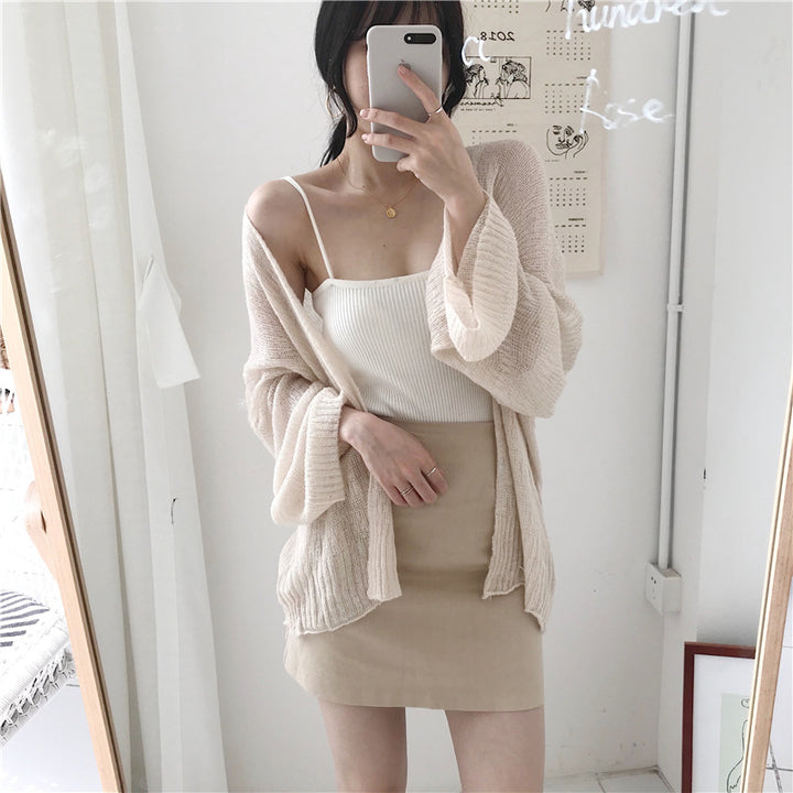 Casual knitted cardigan for women with a loose fit and open sleeves Lune Londonl