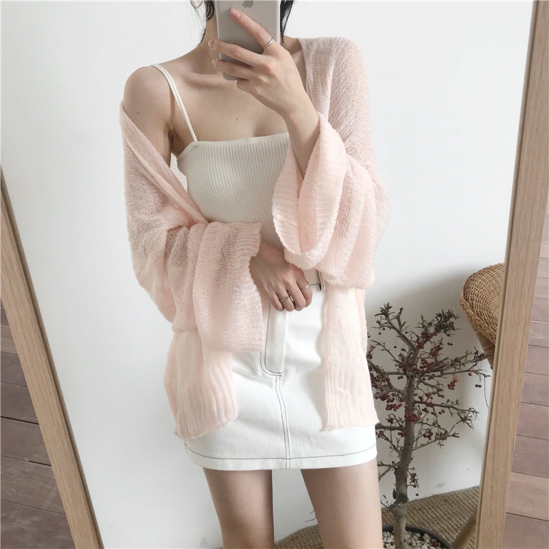 Casual knitted cardigan for women with a loose fit and open sleeves Lune Londonl