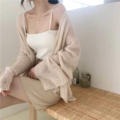 Casual knitted cardigan for women with a loose fit and open sleeves Lune Londonl